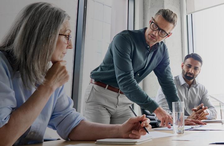 Mature female in business meeting